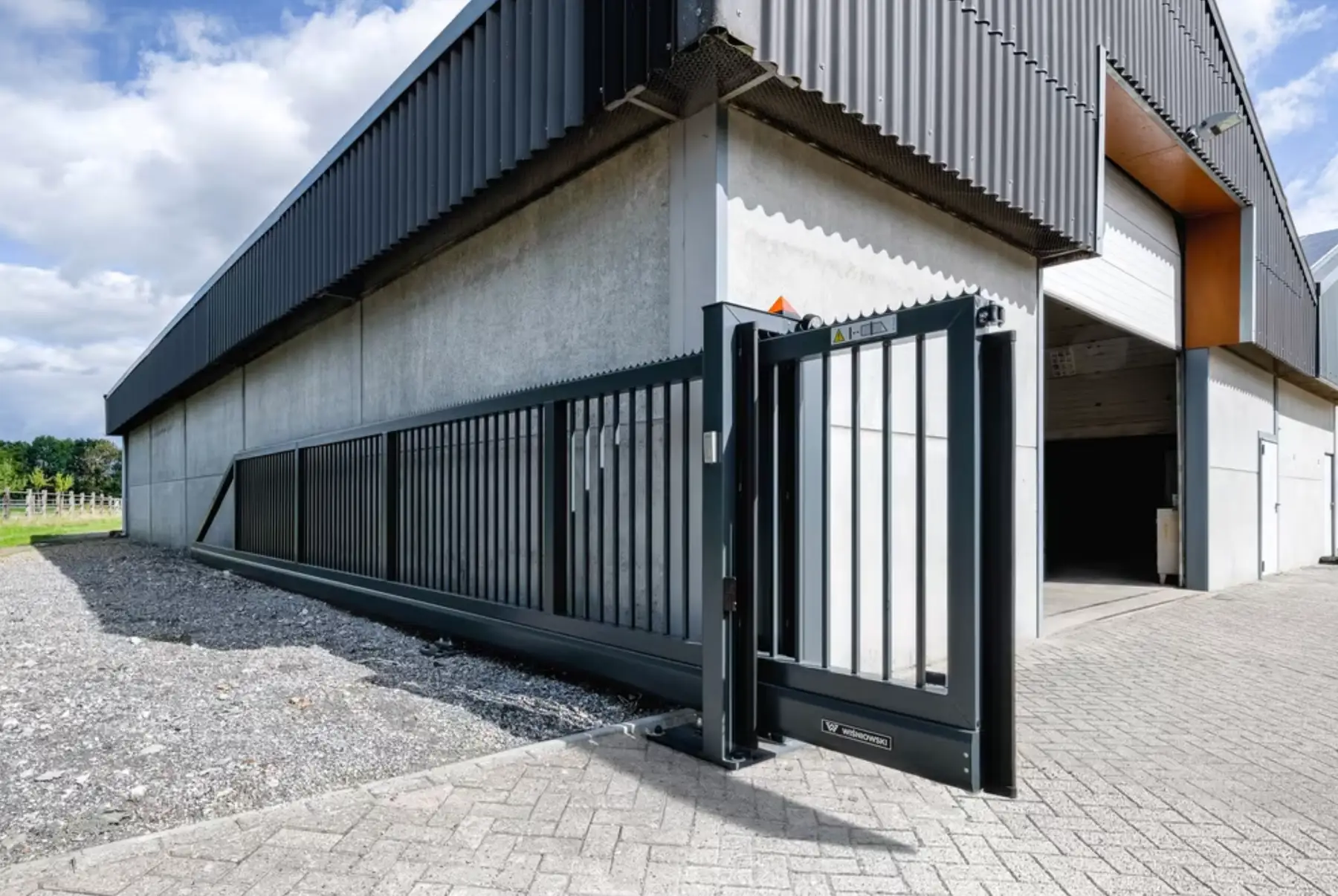 Aluminium side gate and garage at a home in Romford
