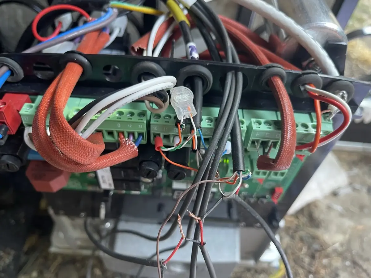 Engineer diagnosing a gate control board