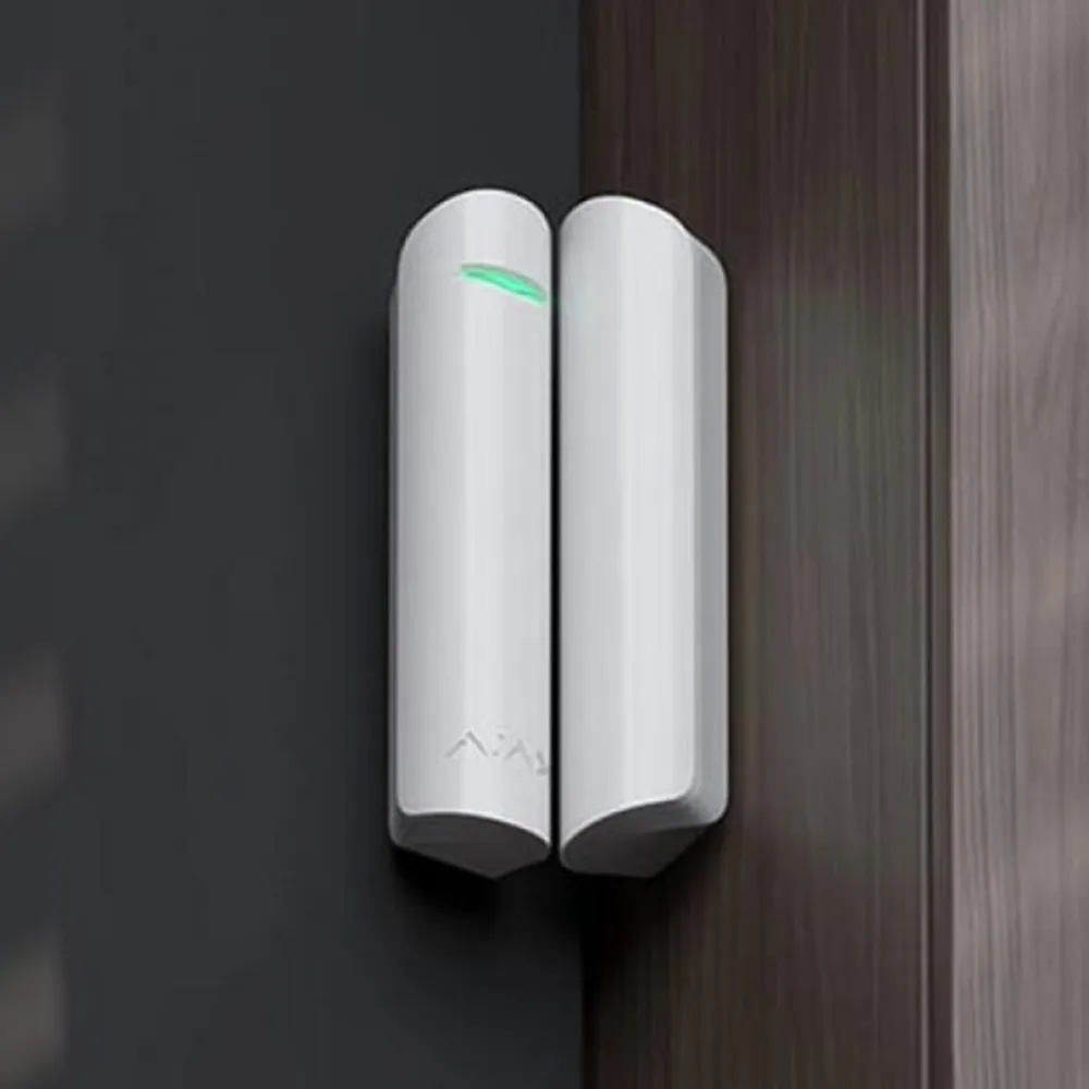 Alarm sensor installed on a wall